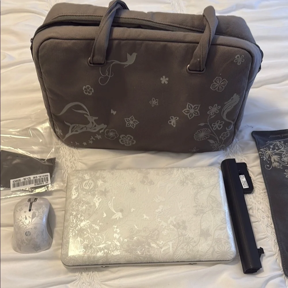 HP Laptop with Accessories in Gray and White